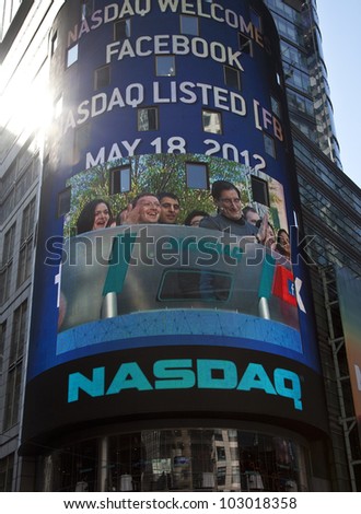NEW YORK - MAY 18: Facebook CEO Mark Zukerberg is flashed on a screen outside the NASDAQ stock exchange at the opening bell in Times Square on May 18, 2012 in New York City.
