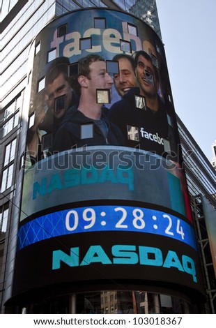 NEW YORK - MAY 18: Facebook CEO Mark Zukerberg is flashed on a screen outside the NASDAQ stock exchange at the opening bell in Times Square on May 18, 2012 in New York City.