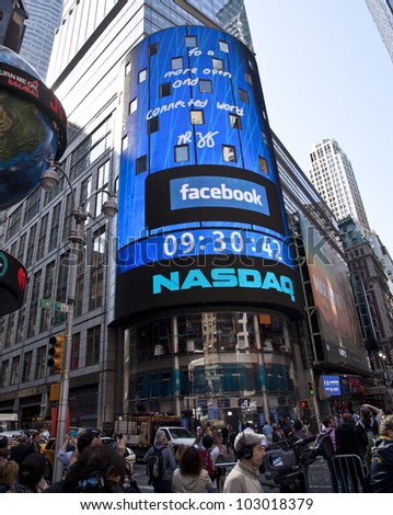 NEW YORK - MAY 18: Message signed by Facebook CEO Mark Zukerberg is flashed on a screen outside the NASDAQ stock exchange at the opening bell in Times Square on May 18, 2012 in New York City.