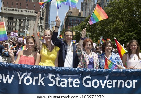 NEW YORK - JUNE 24: New York State Governor Andrew Cuomo City Council Speaker Christine Quinn and Sandra Lee attend 2012 New York City\'s Pride March in New York on June 24, 2012.
