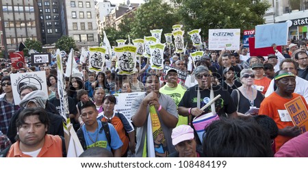 NEW YORK - JULY 24: Unidentified union members rally in support to fight inequality and locked out workers of Con Edison on Union Square in Manhattan on July 24, 2012 in New York.