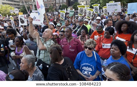 NEW YORK - JULY 24: Unidentified union members rally in support to fight inequality and locked out workers of Con Edison on Union Square in Manhattan on July 24, 2012 in New York.