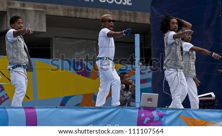 NEW YORK - AUGUST 25: Band Mindless Behavior performs at Kids Day at US Open tennis tournament sponsored by Hess on August 25, 2012 in Queens New York