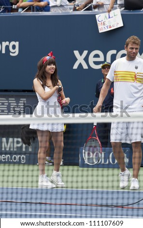 NEW YORK - AUGUST 25: Carly Rae Jepsen and Mardy Fish perform at Kids Day at US Open tennis tournament sponsored by Hess on August 25, 2012 in Queens New York