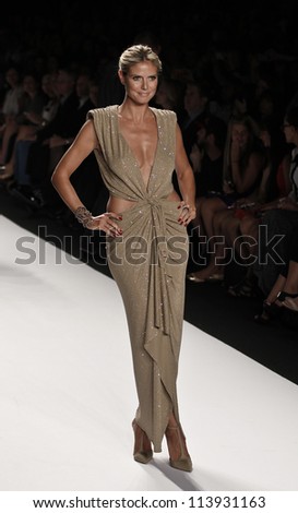NEW YORK - SEPTEMBER 07: Heidi Klum  walks the runway for Project Runway Collection during Spring/Summer 2013 at Mercedes-Benz Fashion Week on September 07, 2012 in New York