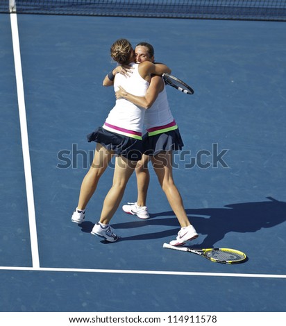 NEW YORK - SEPTEMBER 9: Roberta Vinci/Sara Errani of Italy celebrate women doubles champions won against Lucie Hradecka/Andrea Hlavackova of Czech Republic at US Open tennis on Sep 9, 2012 in NYC