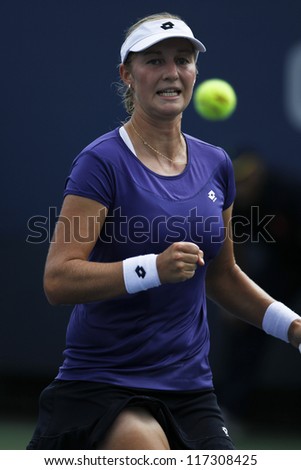 NEW YORK - AUGUST 28: Ekaterina Makarova of Russia reacts during 1st round match against Eleni Danilidou of Greece at US Open tennis tournament on August 28, 2012 in Flushing Meadows New York