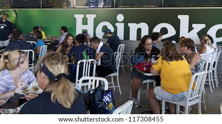 NEW YORK - AUGUST 28: Customers enjoy food and drinks at new Heineken restaurant at US Open tennis tournament on August 28, 2012 in Flushing Meadows New York