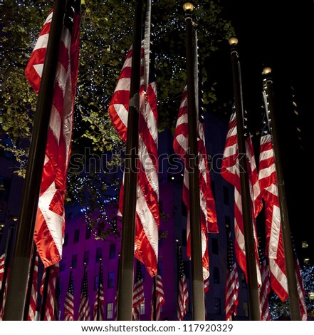 NEW YORK - NOVEMBER 06: American flags illuminated on 2012 Election day Presidential election on Rockefeller plaza on democracy Plaza sponsored by Microsoft on November 06, 2012 in NYC