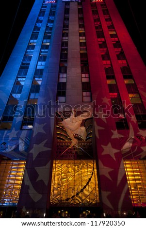 NEW YORK - NOVEMBER 06: GE building illuminated on 2012 Election day Presidential election on Rockefeller plaza on democracy Plaza sponsored by Microsoft on November 06, 2012 in NYC