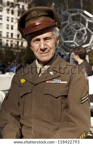 NEW YORK - NOVEMBER 11: World War II veteran corporal Frnak Milano attends opening ceremony Veteran\'s Day Parade in Madison Square Park on November 11, 2012 in New York City