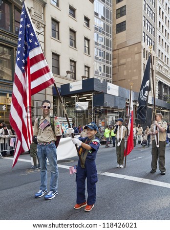 NEW YORK - NOVEMBER 11: Unidentified boy scouts walks at Veteran\'s Day Parade along 5th Avenue on November 11, 2012 in New York City