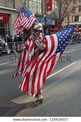 NEW YORK - NOVEMBER 11: Unidentified participant walks at Veteran\'s Day Parade along 5th Avenue on November 11, 2012 in New York City