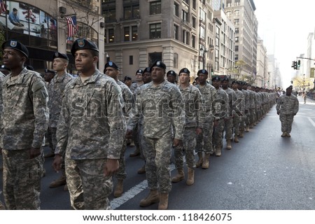 NEW YORK - NOVEMBER 11: Members of US Army walk at Veteran\'s Day Parade along 5th Avenue on November 11, 2012 in New York City