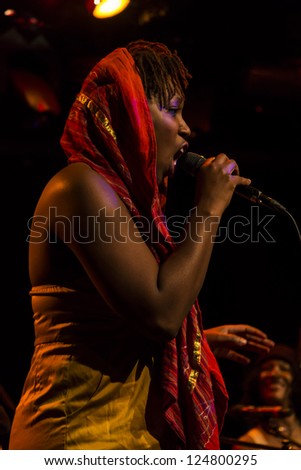 NEW YORK - JANUARY 12: Imani Uzuri performs with Celebrate Great Women of Blues and Jazz band on stage as part of NYC Winter Jazz Festival at Le Poisson Rouge on January 12, 2013 in New York City