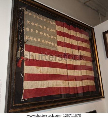 NEW YORK - JANUARY 23: Antique American flag presented by Jeff Bridgeman American Antiques at opening night of 2nd annual NYC Metro Show at Metropolitan Pavilion on January 23, 2013 in New York