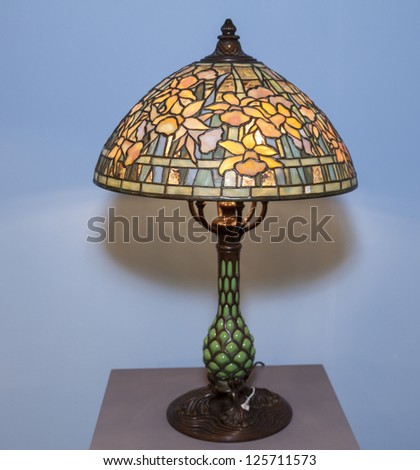 NEW YORK - JANUARY 23: Antique Tiffany Studios lamp presented by Lillian Nassau gallery at opening night of 2nd annual NYC Metro Show at Metropolitan Pavilion on January 23, 2013 in New York City