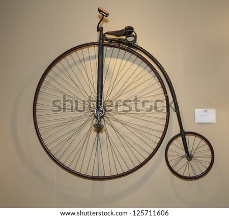 NEW YORK - JANUARY 23: Antique 19th century high wheeler bicycle presented by Just Folk gallery at opening night of 2nd annual NYC Metro Show at Metropolitan Pavilion on January 23, 2013 in New York