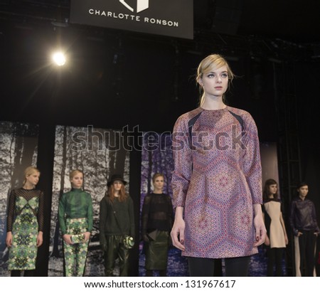 NEW YORK - FEBRUARY 8: Model shows off dresses at Fall 2013 presentation for collection by Charlotte Ronson at Mercedes-Benz Fashion Week at Lincoln Center on February 8, 2013 in New York