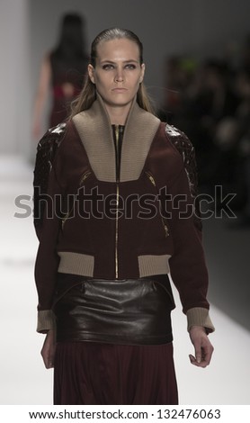 NEW YORK - FEBRUARY 07: Model walks runway at Fall 2013 show for Concept Korea collection Cres. E. Dim by Hongbum Kim at Mercedes-Benz Fashion Week at Lincoln Center on February 07, 2013 in New York