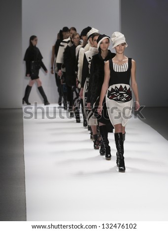 NEW YORK - FEBRUARY 07: Models walk runway at Fall 2013 show for Concept Korea collection at Mercedes-Benz Fashion Week at Lincoln Center on February 07, 2013 in New York