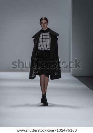 NEW YORK - FEBRUARY 07: Model walks runway at Fall 2013 show for Concept Korea collection by Lie Sang Bong at Mercedes-Benz Fashion Week at Lincoln Center on February 07, 2013 in New York