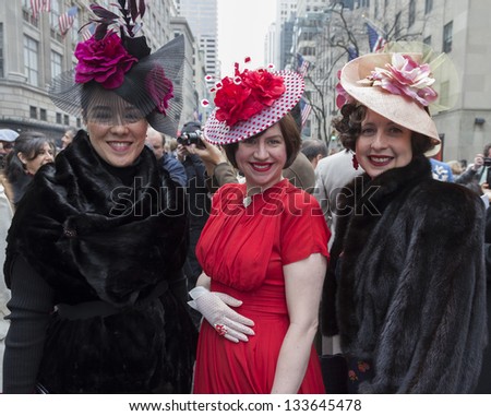 NEW YORK - MARCH 31: Unidentified women partake and show off their hats at the Easter Bonnet Parade on 5th Avenue on March 31, 2013 in New York City.