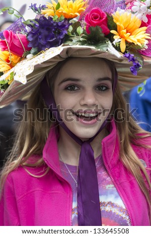 NEW YORK - MARCH 31: Unidentified girl partakes and shows off their hats at the Easter Bonnet Parade on 5th Avenue on March 31, 2013 in New York City.