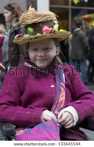 NEW YORK - MARCH 31: Unidentified girl partakes and shows off their hats at the Easter Bonnet Parade on 5th Avenue on March 31, 2013 in New York City.