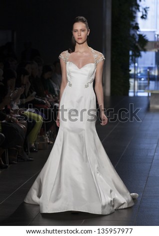 NEW YORK - APRIL 21: Model walks runway for Rivini collection by Rita Vinieris during Bridal week in The David Rubenstein Atrium at Lincoln Center on April 21, 2013 in New York City