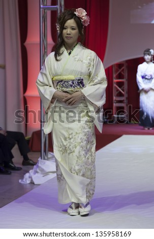NEW YORK - APRIL 19: Model walks runway for Kimono Fashion Show NYC celebration of Japanese Culture at Grand Central Teminal Vanberbilt Hall on April 19, 2013 in New York City