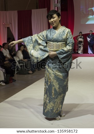 NEW YORK - APRIL 19: Model walks runway for Kimono Fashion Show NYC celebration of Japanese Culture at Grand Central Teminal Vanberbilt Hall on April 19, 2013 in New York City