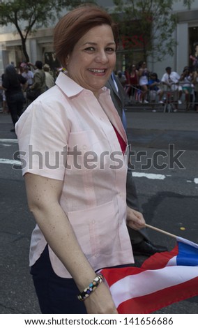 NEW YORK - JUNE 09: Speaker of the New York City Council Christine Quinn attends the National Puerto Rican Day Parade on the streets of Manhattan on June 09, 2013 in New York City