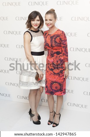 NEW YORK - JUNE 18: Emily VanCamp & Katherine McPhee attend Dramatically Different Party hosted by Clinique launch new Moisturizing Lotion at Loft & Garden at Rockefeller Center on June 18 2013 in NYC