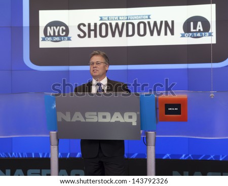 NEW YORK - JUNE 26: Brad Peterson executive vice president speaks at the NASDAQ MarketSite during Opening bell ring on June 26, 2013 in New York City