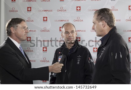 NEW YORK - JULY 10: Francois Barras conducts interview with Andre Borschberg, Bertrand Piccard at dinner to celebrate Solar Impulse plane arrival in NYC at Center 548 on July 10, 2013 in New York City