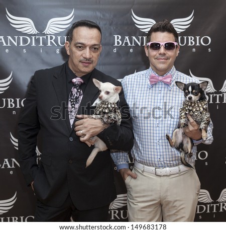 NEW YORK - AUGUST 11: Designer Anthony Bandit-Rubio and guest attend Dog fashion show By Bandit-Rubio at Roger Smith Hotel on August 11, 2013 in New York City