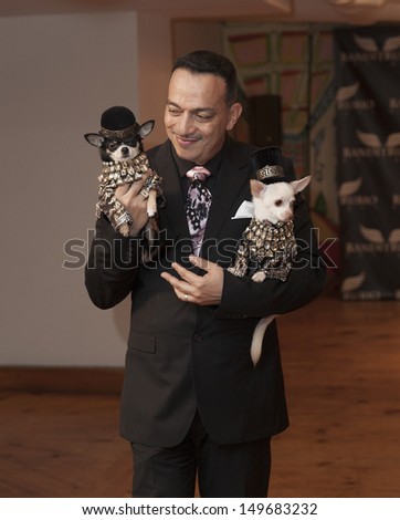NEW YORK - AUGUST 11: Designer Anthony Bandit-Rubio walks runway at Dog fashion show By Bandit-Rubio at Roger Smith Hotel on August 11, 2013 in New York City