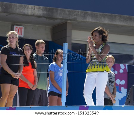 New York - August 24: First Lady Michelle Obama Greets Young Players On Stage During Arthur Ashe Kids Day Presentation At Billie Jean King National Tennis Center On August 24, 2013 In New York City