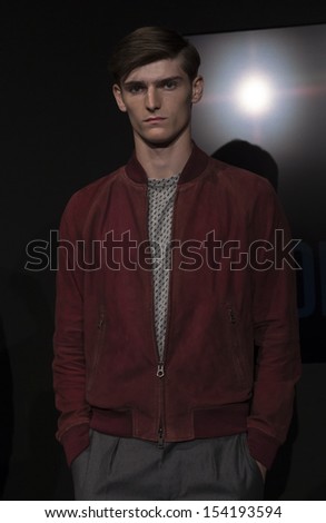 NEW YORK - SEPTEMBER 06: Model shows off clothes during Spring/Summer 2014 Fashion week for Todd Snyder collection at Lincoln Center on September 06, 2013 in New York City