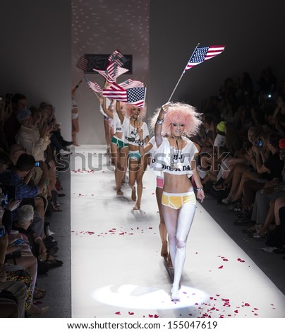 NEW YORK - SEPTEMBER 11: Models walk runway during Spring/Summer 2014 Fashion week for collection by Betsey Johnson at Lincoln Center on September 11, 2013 in New York
