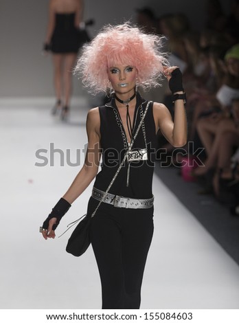 NEW YORK - SEPTEMBER 11: Model walks runway during Spring/Summer 2014 Fashion week for collection by Betsey Johnson at Lincoln Center on September 11, 2013 in New York