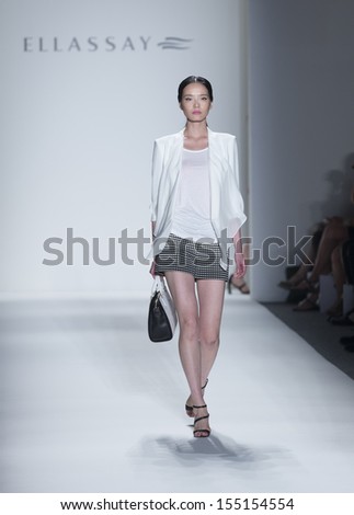 NEW YORK - SEPTEMBER 10: Model walks runway during Spring/Summer 2014 Fashion week for Fashion Shenzhen collection Ellassay by Xi Guoxin at Lincoln Center on September 10, 2013 in New York