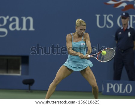 NEW YORK - AUGUST 31: Camila Giorgi of Italy returns ball during 3rd round match against Caroline Wozniacki of Denmark at 2013 US Open at USTA Billie Jean King Tennis Center on August 31, 2013 in NYC