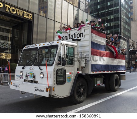 NEW YORK - OCTOBER 14: Decorated department of sanitation truck at annual Columbus Day Parade on 5th Avenue on October 14, 2013 in New York City