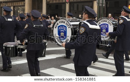 NEW YORK - OCTOBER 14: New York City Police band attends annual Columbus Day Parade on 5th Avenue on October 14, 2013 in New York City