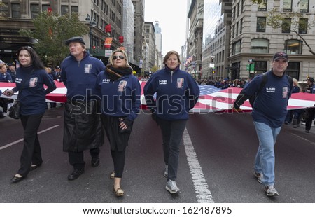 NEW YORK - NOVEMBER 11: Atmosphere during the 94th annual New York City Veterans Day Parade on 5th Avenue on November 11, 2013 in New York City