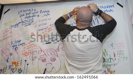 NEW YORK - NOVEMBER 11: Unidentified fan post message on message board during Artpop Pop Up: A Lady Gaga Gallery in Meatpacking District on November 11, 2013 in New York City