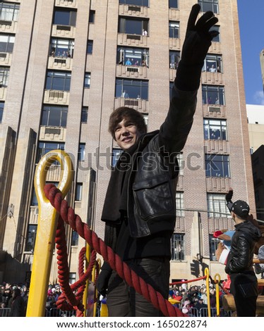 NEW YORK - NOVEMBER 28: Austin Mahone rides the float at the 87th Annual Macy\'s Thanksgiving Day Parade on November 28, 2013 in New York City.