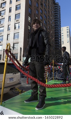 NEW YORK - NOVEMBER 28: Austin Mahone rides the float at the 87th Annual Macy\'s Thanksgiving Day Parade on November 28, 2013 in New York City.
